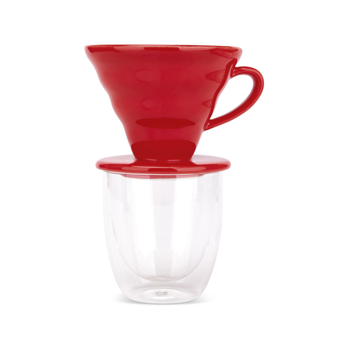 EspressoWorks red ceramic pour over coffee dripper sitting on a double-wall glass cup
