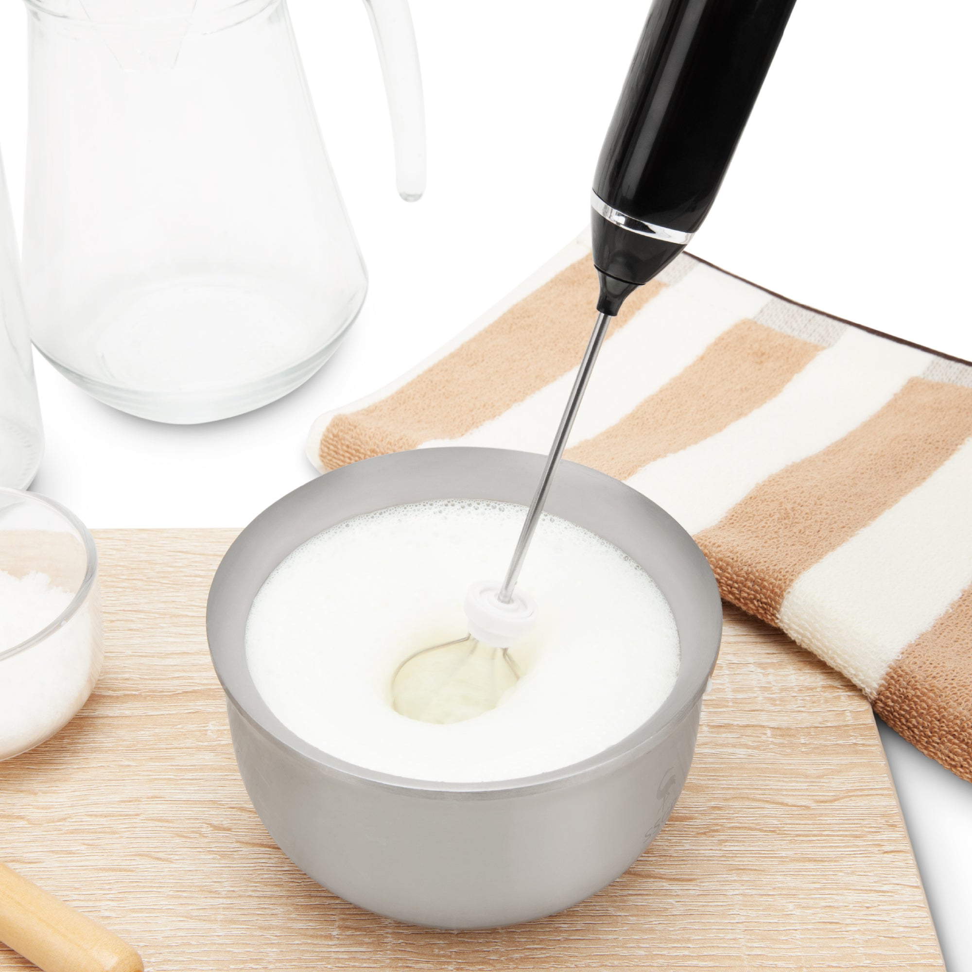 EspressoWorks Handheld Milk Frother in use