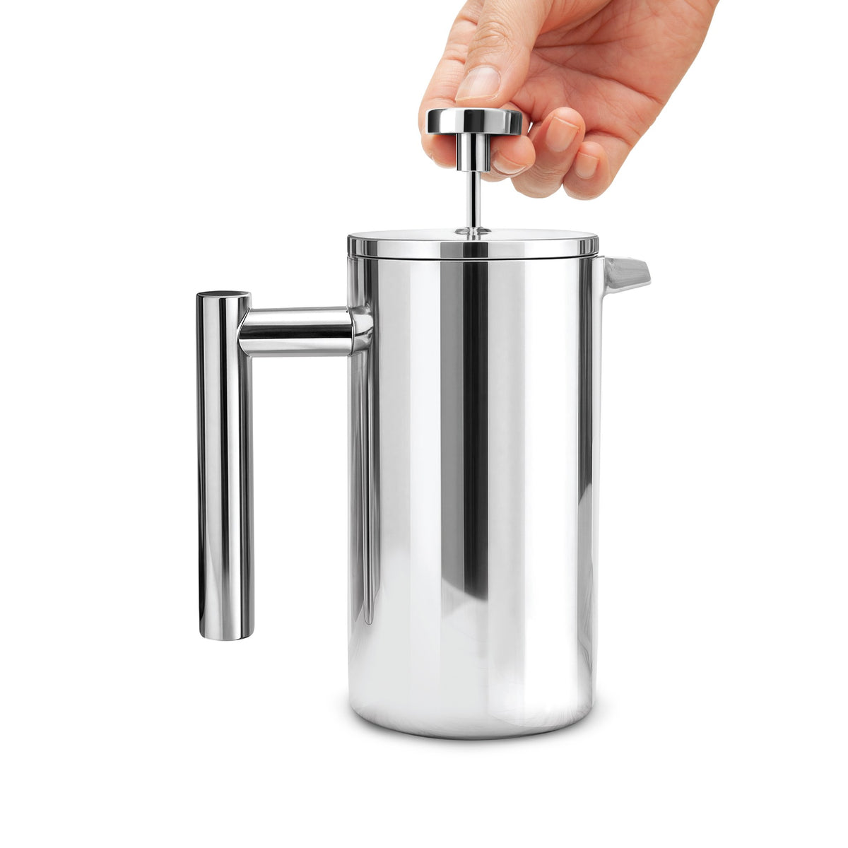 Pressing down the plunger on the EspressoWorks French press