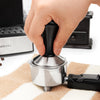 EspressoWorks Espresso Tamper Black expertly tamps in coffee grinds to make a puck for a balanced brew