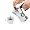 EspressoWorks Moka Pot 6 Cup Stovetop Espresso Maker pouring coffee